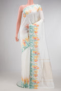 Off White Dual Tone Double Ikat Saree with Plain Body and Ikat Border.  displayed on a mannequin