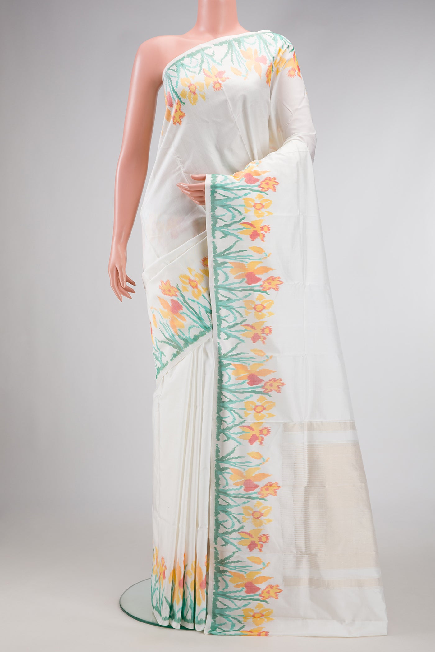 Off White Dual Tone Double Ikat Saree with Plain Body and Ikat Border.  displayed on a mannequin