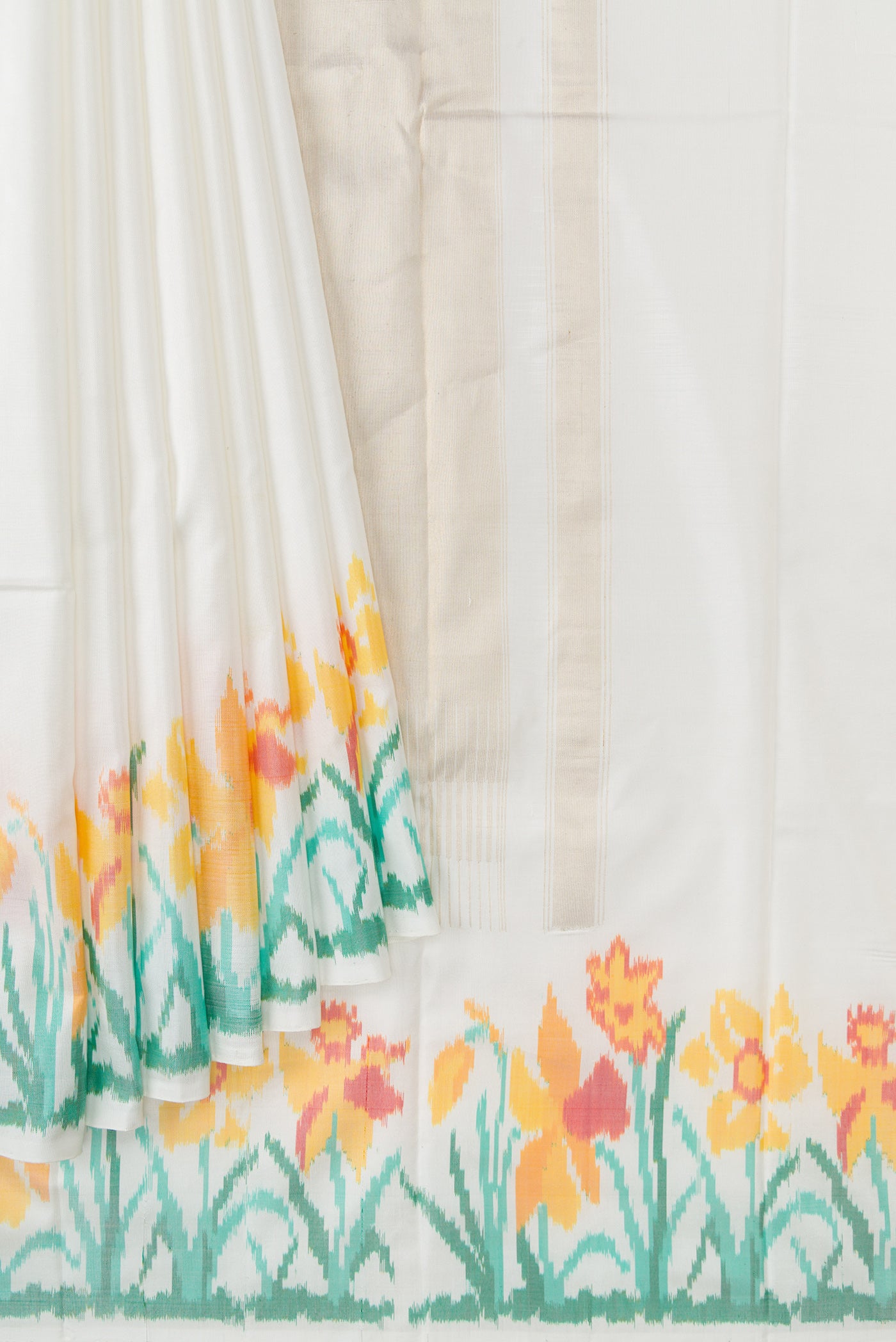 Pleats and pallu of Off White Dual Tone Double Ikat Saree with Plain Body and Ikat Border. 