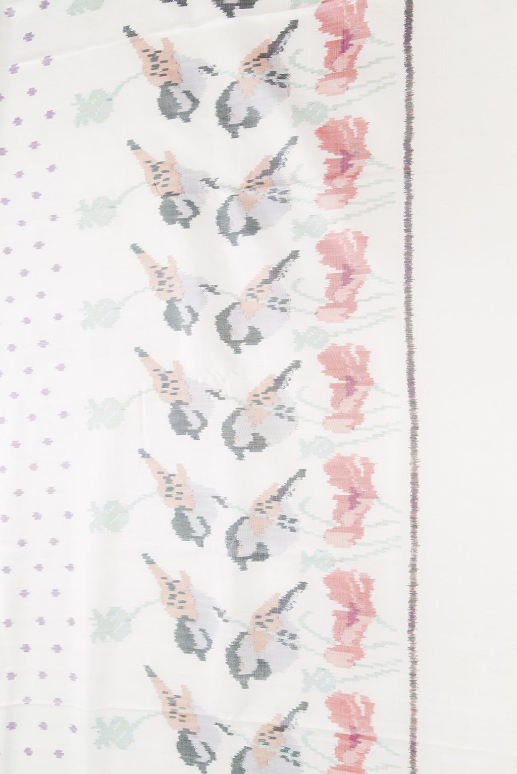 Border image of White Dual Tone Rajkot Patola Silk Saree with Ikat Print on the body and Ikat Border. 