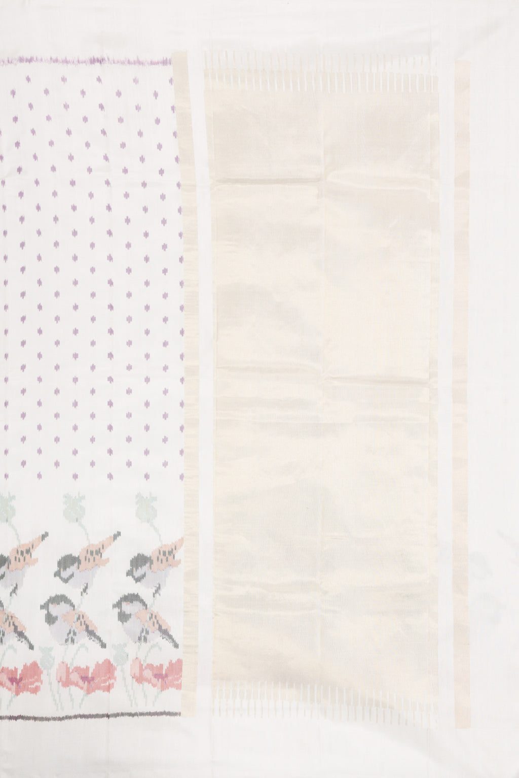 Close up image of the pallu of White Dual Tone Rajkot Patola Silk Saree with Ikat Print on the body and Ikat Border. 