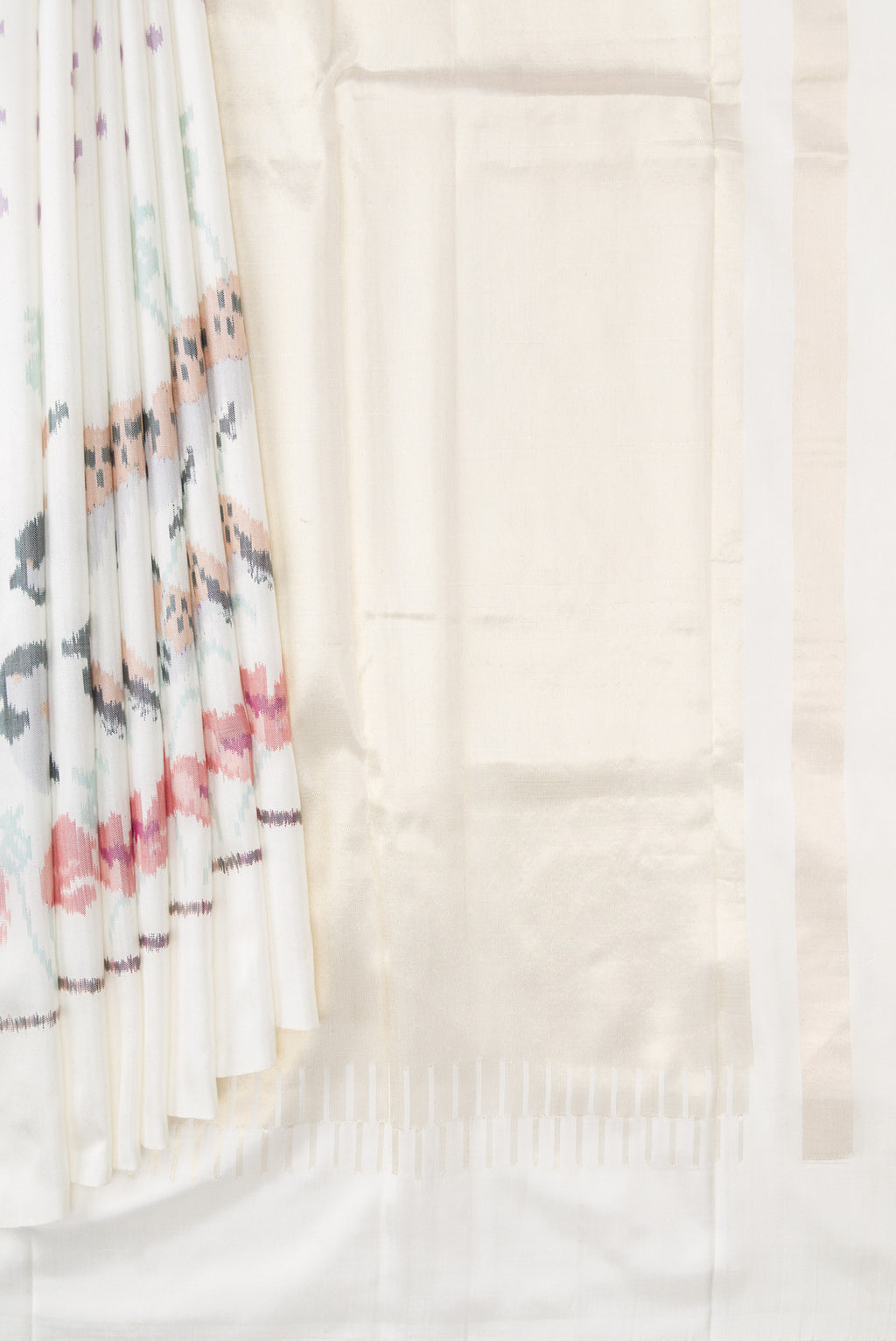 Pleats and pallu of White Dual Tone Rajkot Patola Silk Saree with Ikat Print on the body and Ikat Border. 