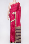 Dark Pink Dual Tone Mysore Crepe Saree with Stripes on the body and Zari Border displayed on a mannequin