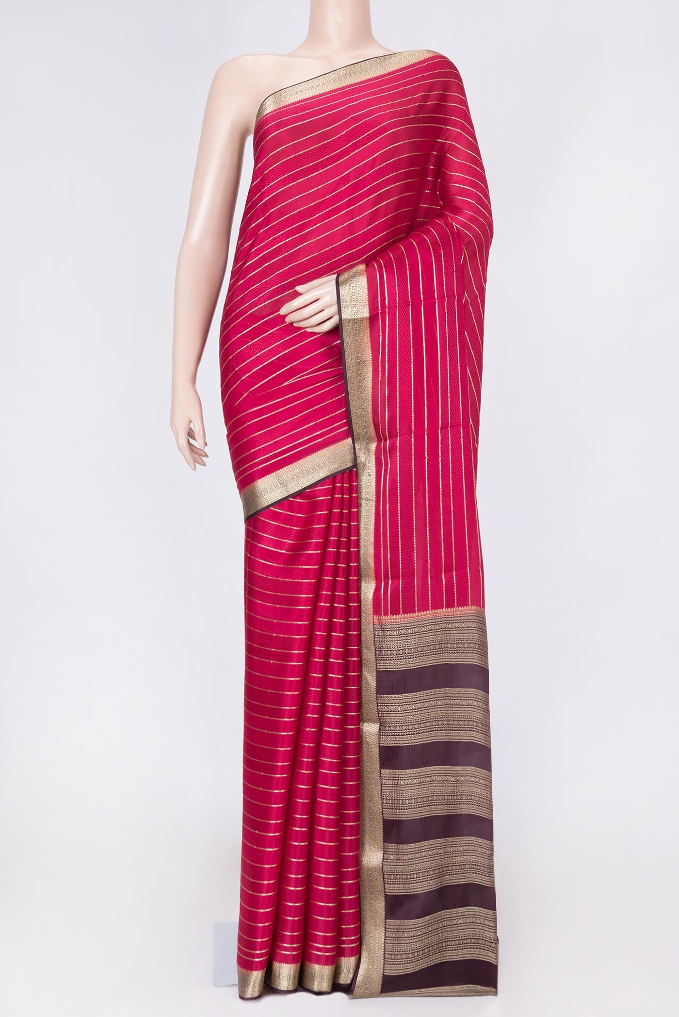 Dark Pink Dual Tone Mysore Crepe Saree with Stripes on the body and Zari Border displayed on a mannequin