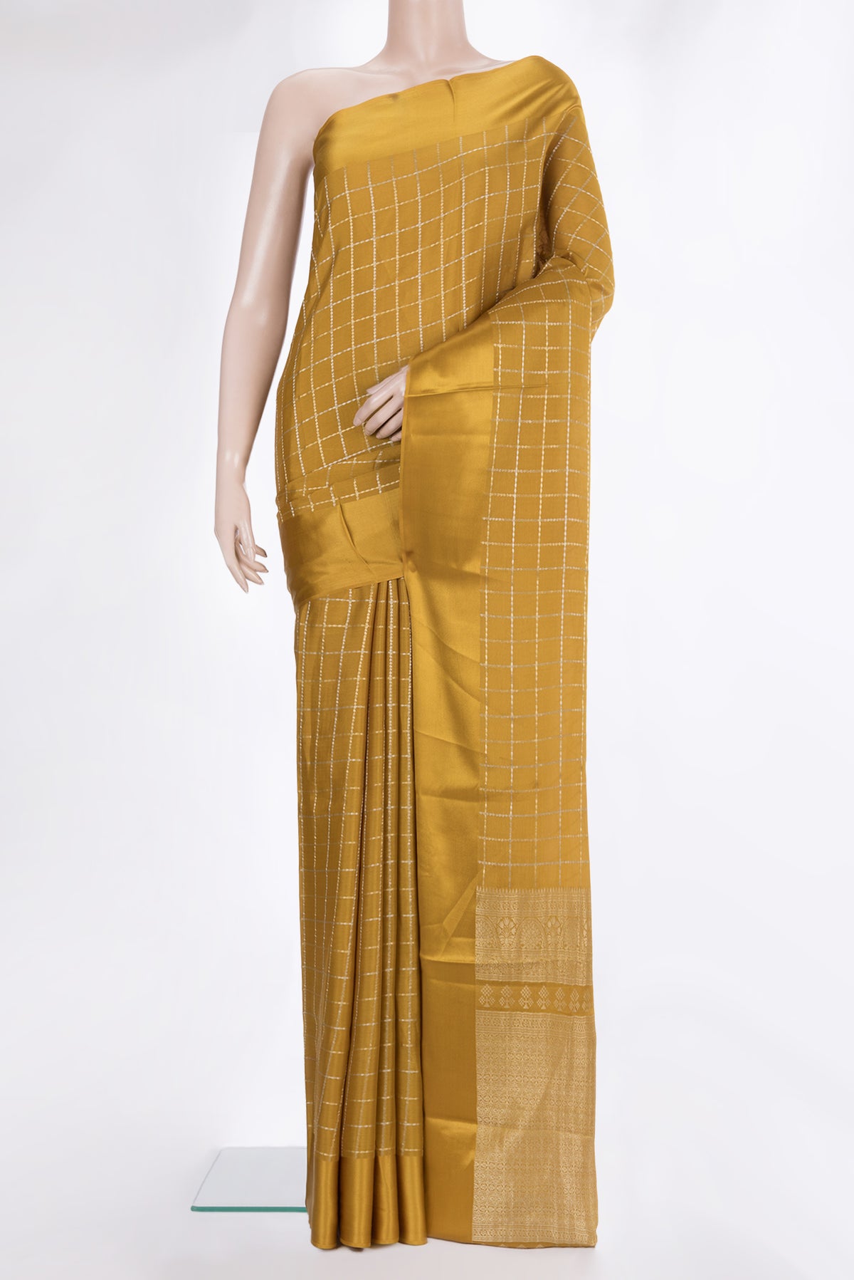 Mustard Dual Tone Georgette Saree with Checked design on the body and Plain Border.  displayed on a mannequin