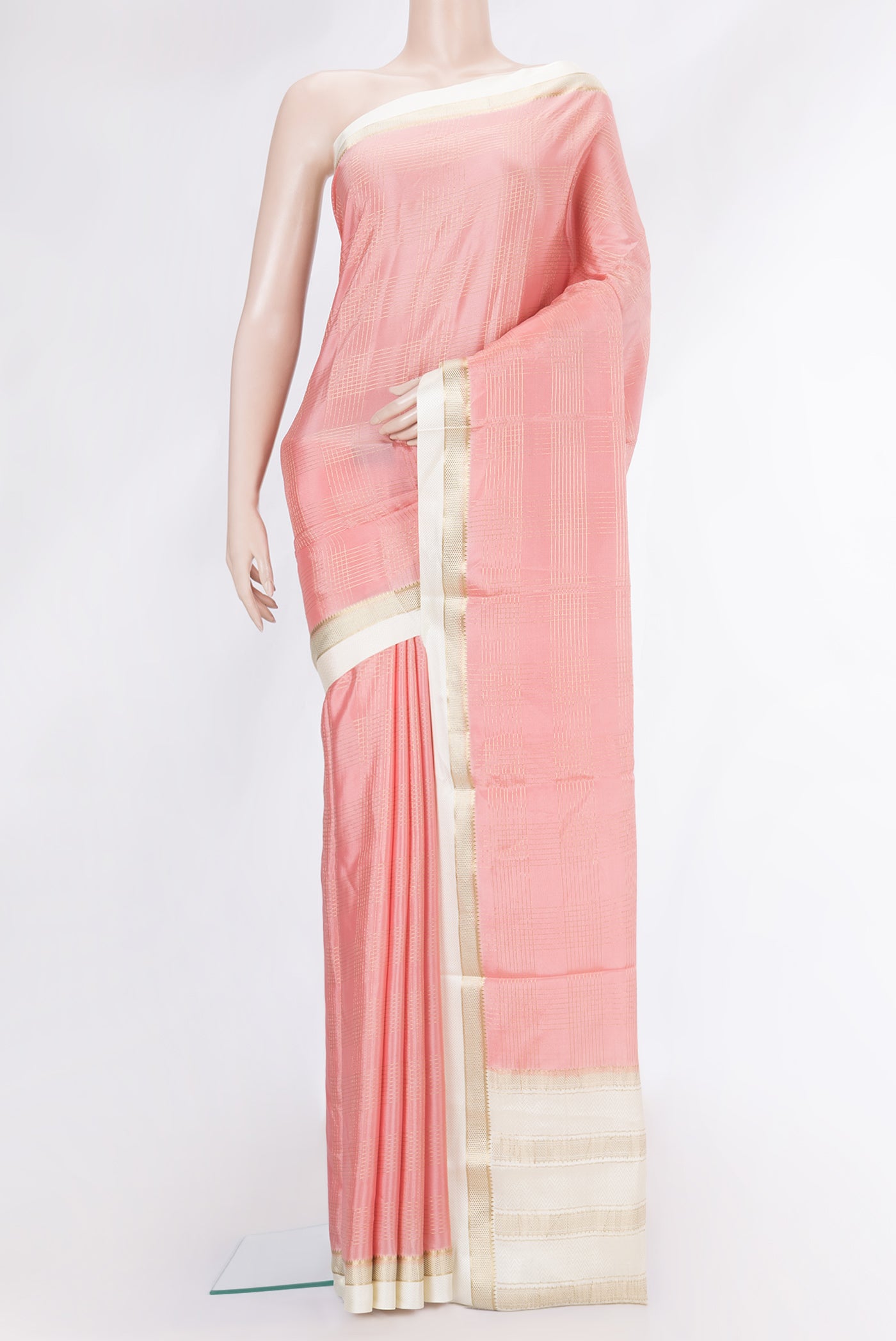 Pink Dual Tone Mysore Silk Saree with Checked design on the body and Zari And Thread Border.  displayed on a mannequin