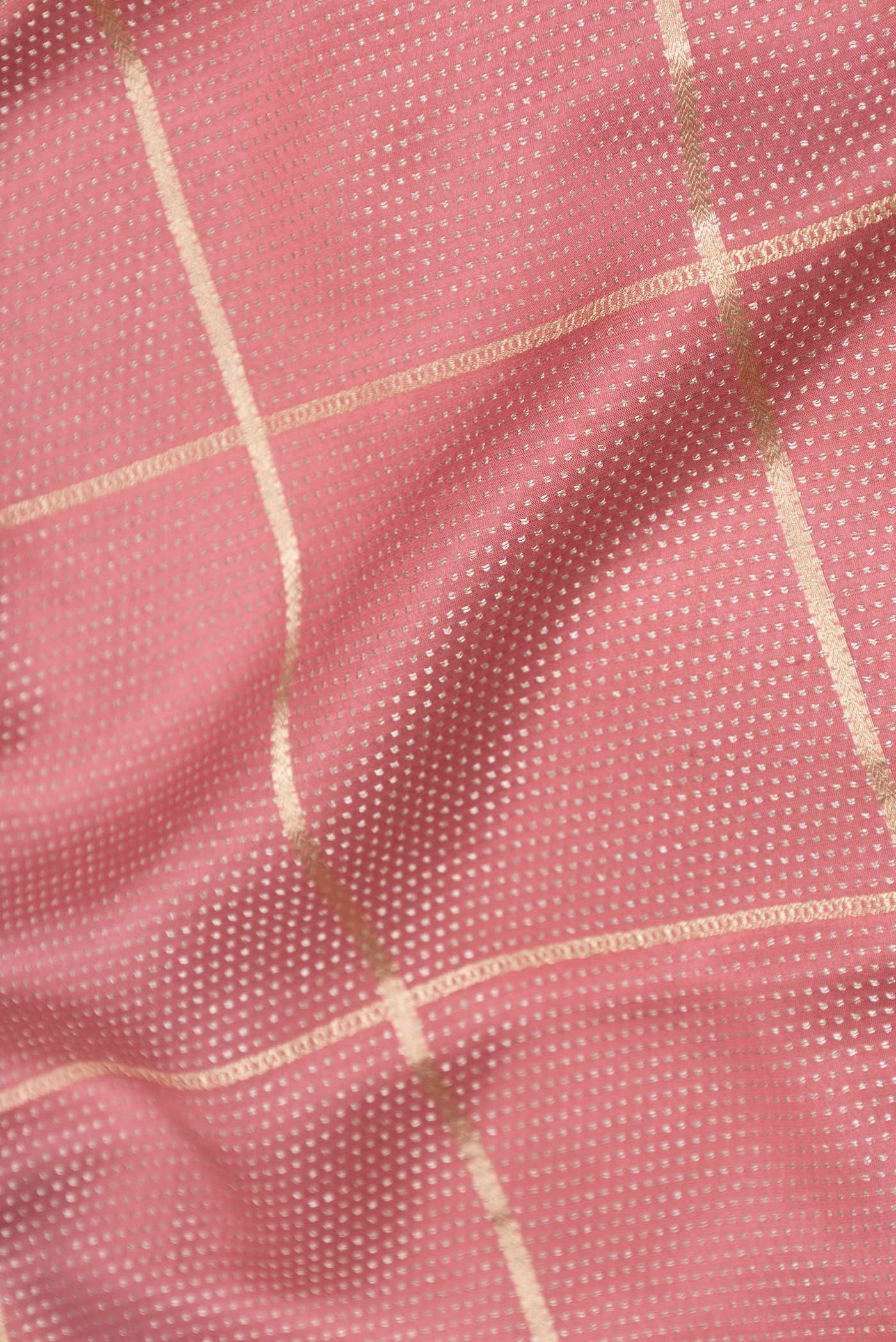 Close up of Pink Dual Tone Banarasi Georgette Saree with Zari Brocade on the body and Zari Border displaying folds