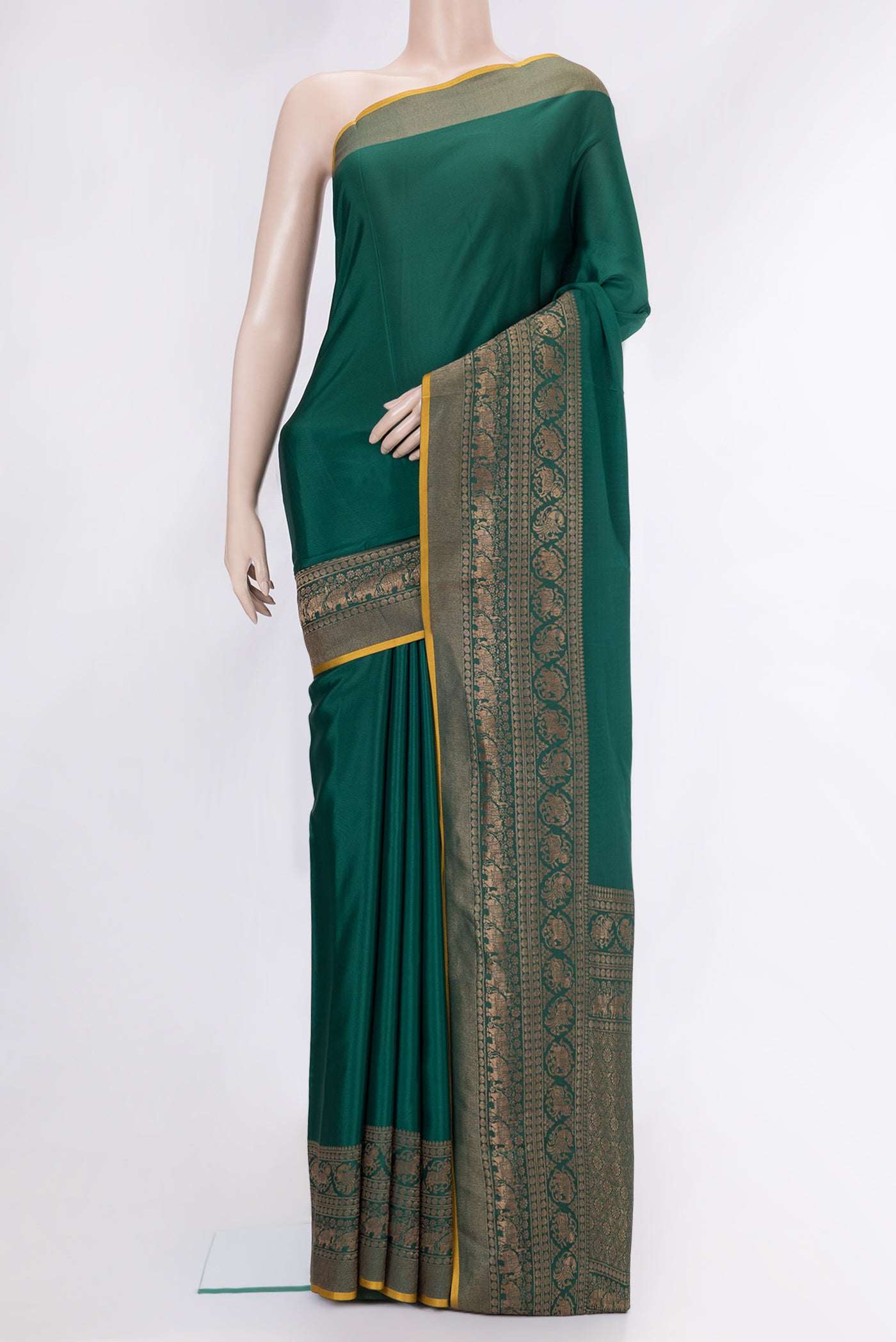 Bottle Green Dual Tone Mysore Crepe Saree with Plain Body and Fancy Border.  displayed on a mannequin