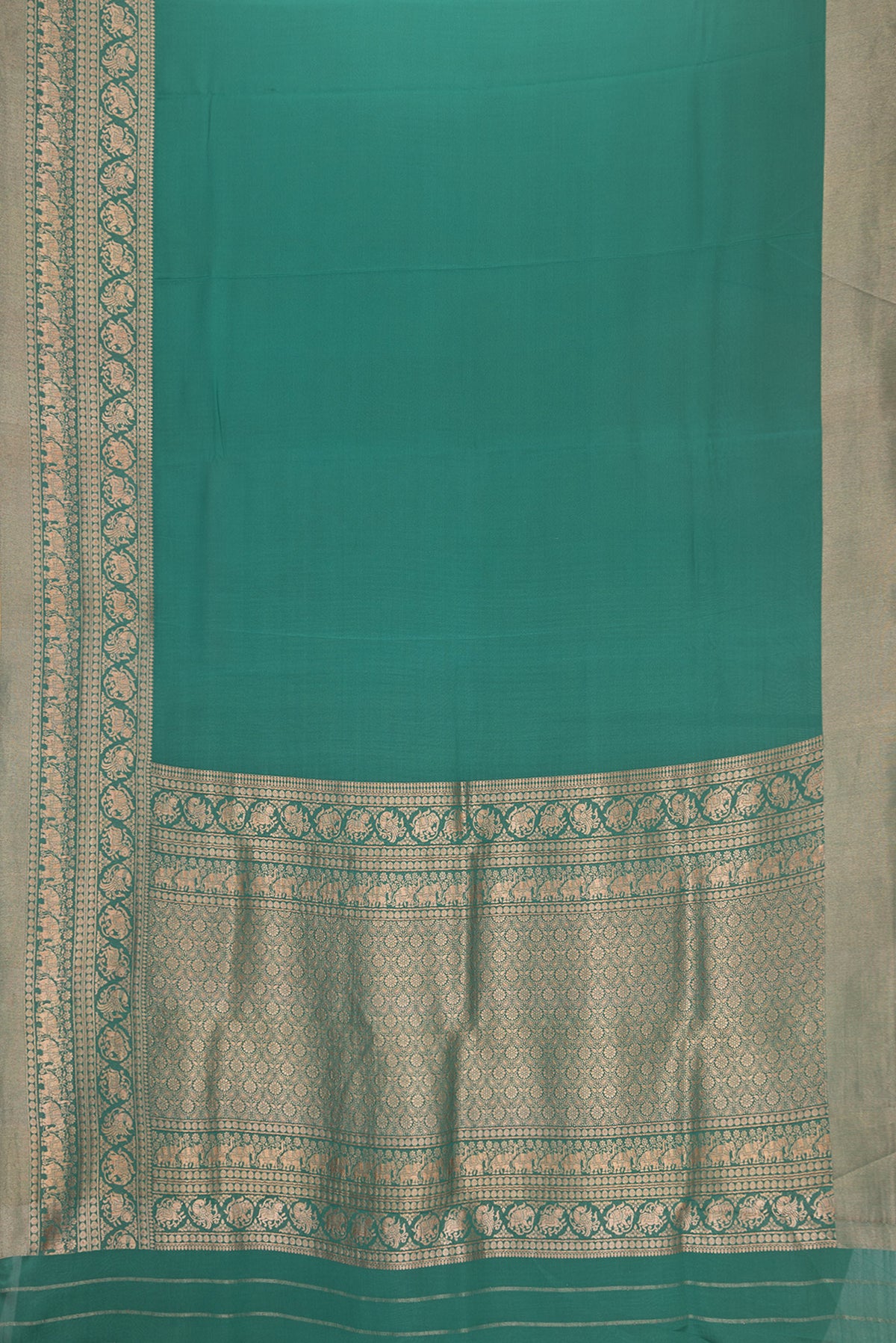 Flat view of Bottle Green Dual Tone Mysore Crepe Saree with Plain Body and Fancy Border. 