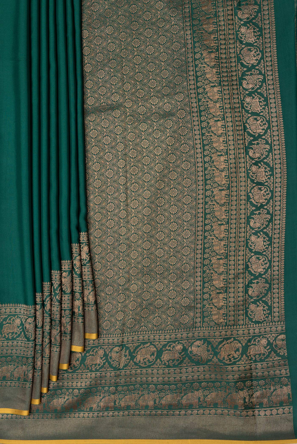 Pleats and pallu of Bottle Green Dual Tone Mysore Crepe Saree with Plain Body and Fancy Border. 