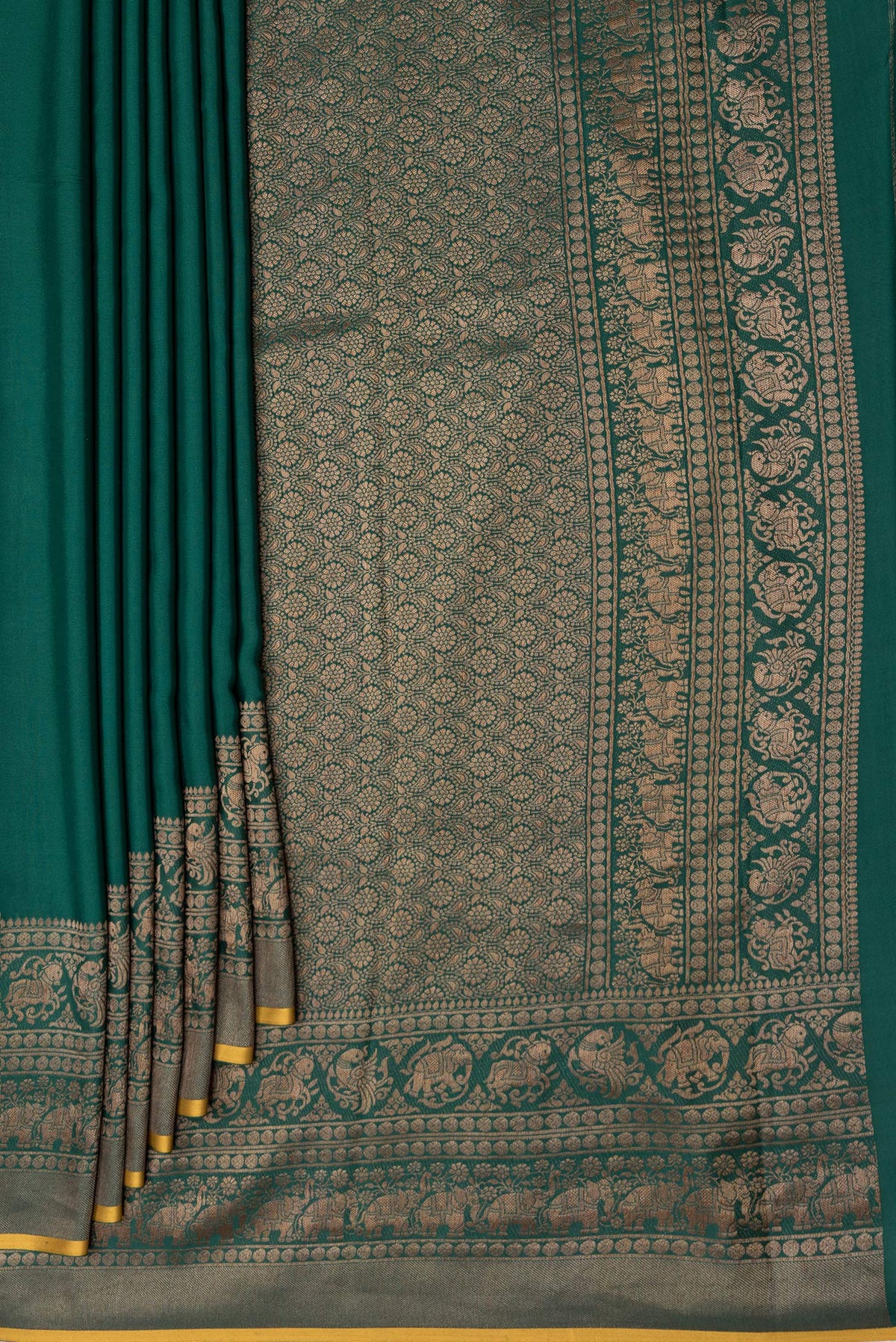 Pleats and pallu of Bottle Green Dual Tone Mysore Crepe Saree with Plain Body and Fancy Border. 