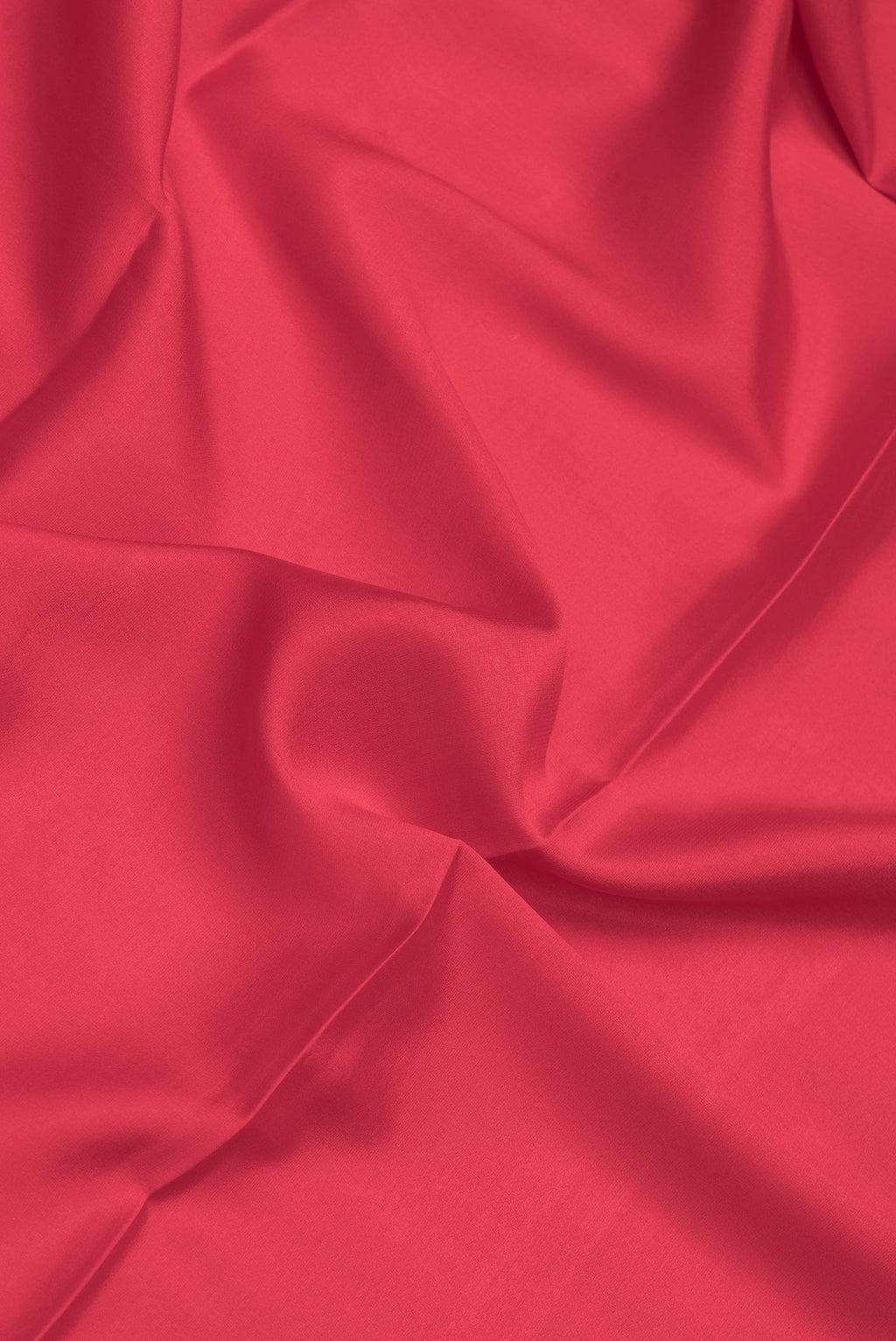 Close up of Red Dual Tone Mysore Crepe Saree with Plain Body and Zari Border.  displaying folds