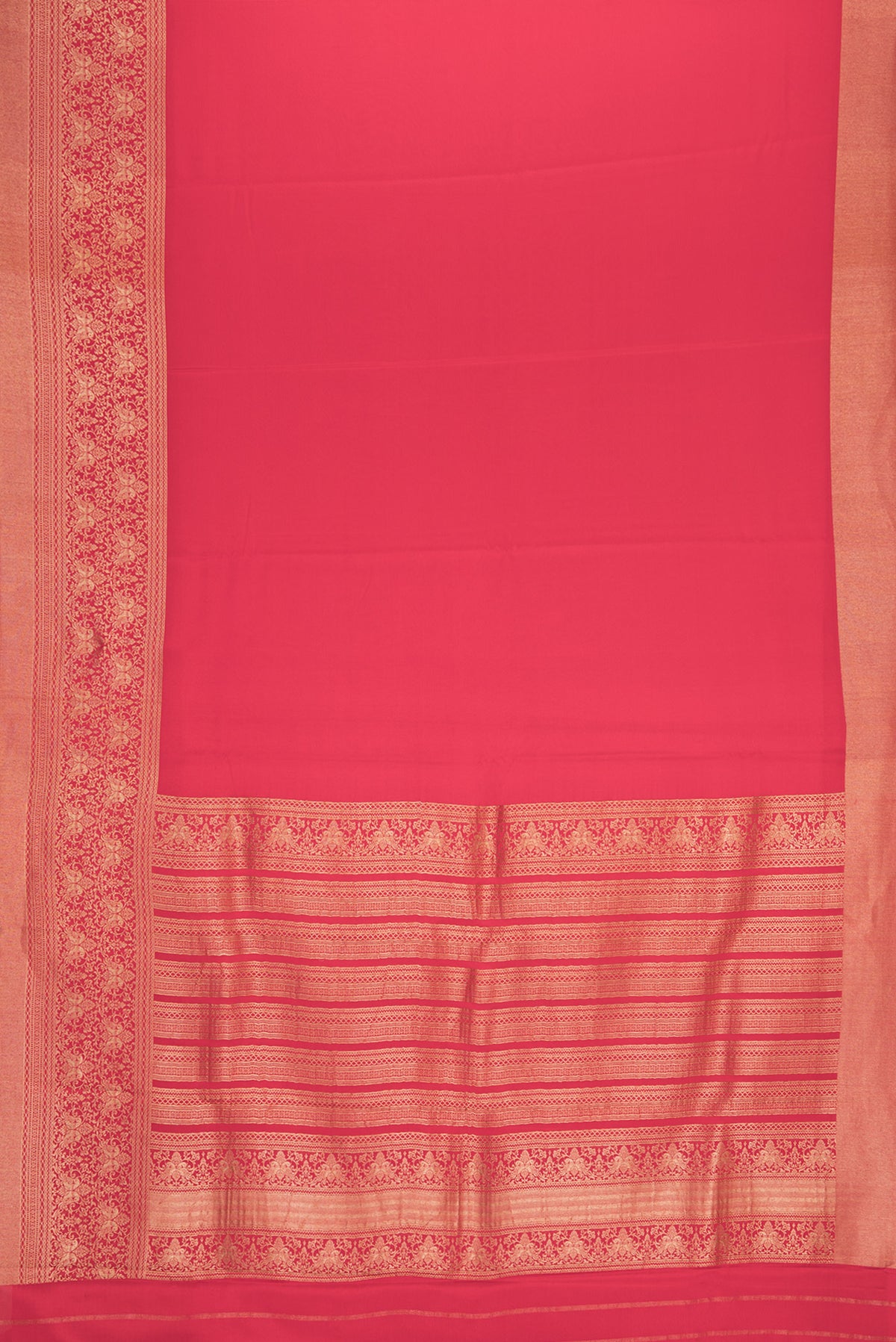 Flat view of Red Dual Tone Mysore Crepe Saree with Plain Body and Zari Border. 