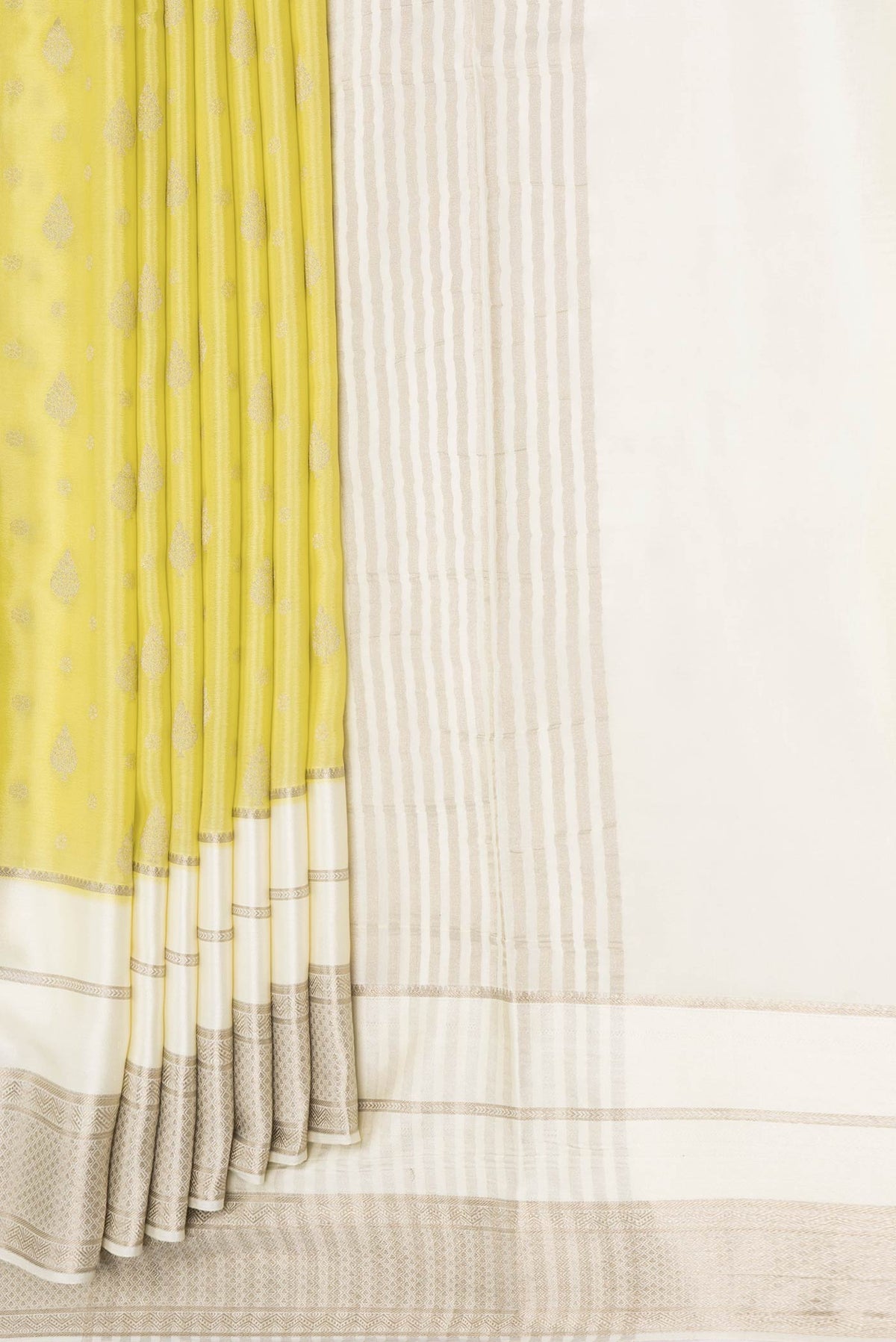 Pleats and pallu of Lemon Yellow Dual Tone Tussar Silk Saree with Zari Butta on the body and Zari Border