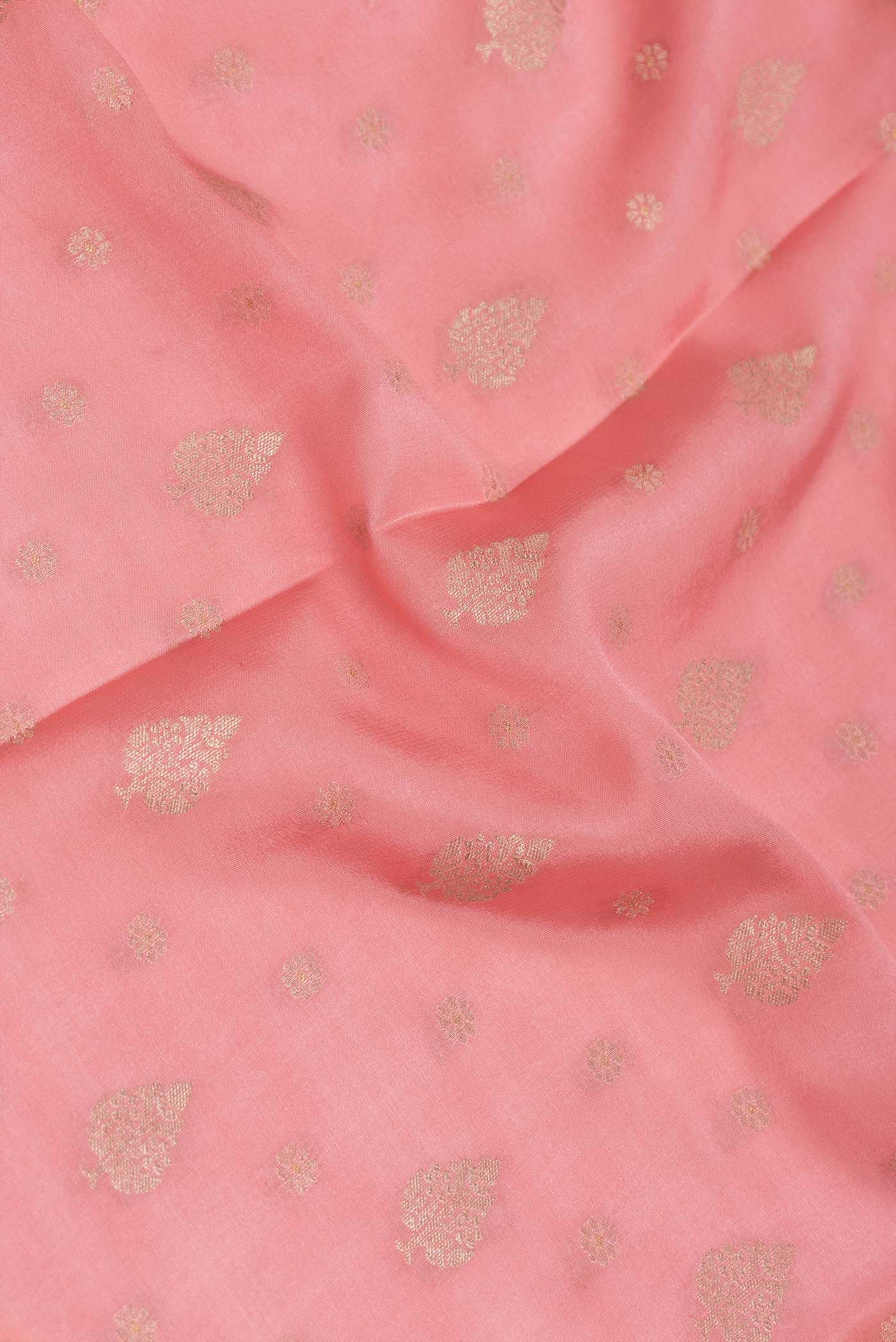 Close up of Pink Dual Tone Mysore Crepe Saree with Zari Butta on the body and Zari Border displaying folds