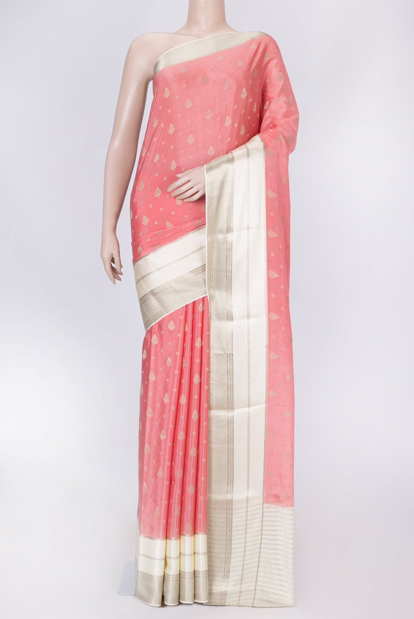Pink Dual Tone Mysore Crepe Saree with Zari Butta on the body and Zari Border displayed on a mannequin
