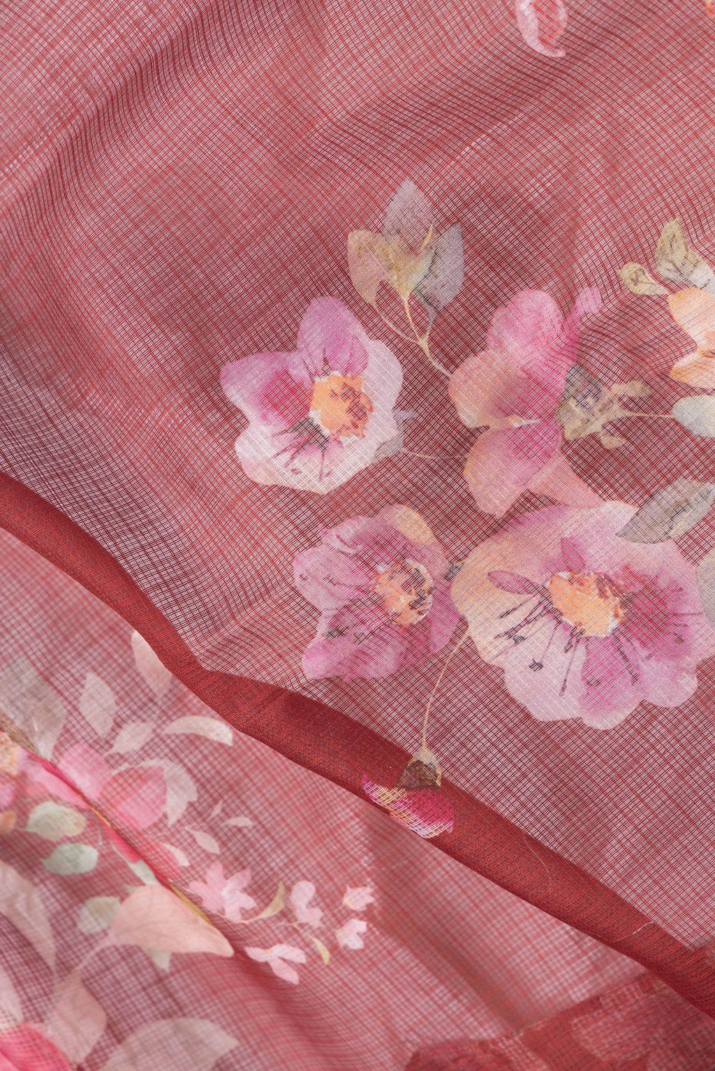 Close up of Red Dual Tone Kota Silk Saree with Printed design on the body and Thread Border.  displaying folds