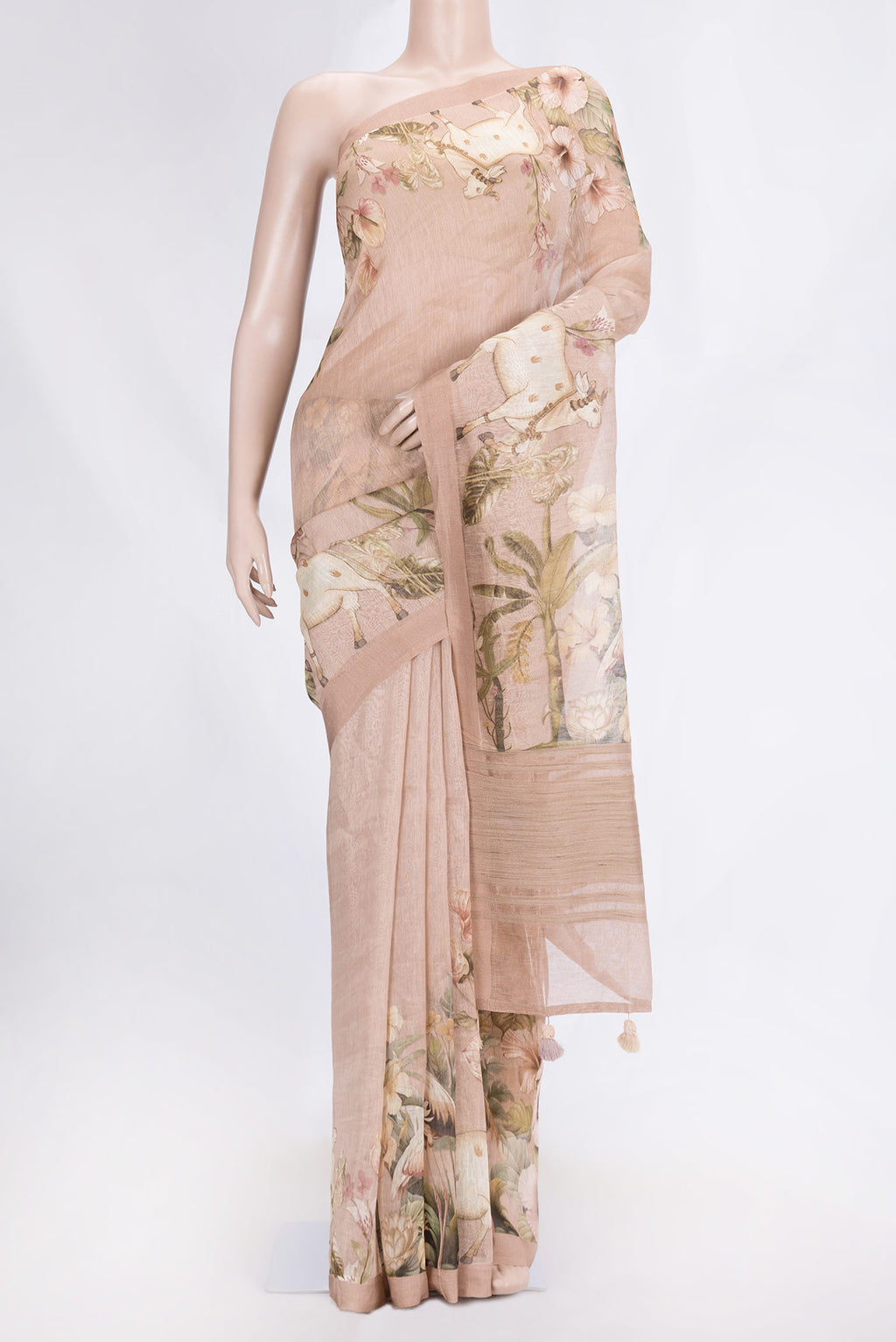 Golden Peach Dual Tone Linen Saree with Printed design on the body and Plain Border.  displayed on a mannequin