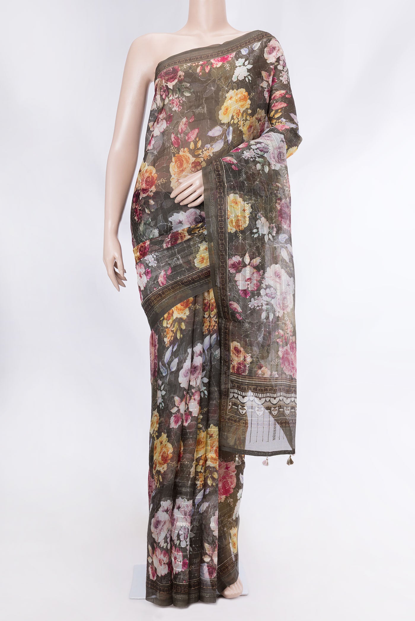 Brown Organza Silk Saree with Embroidery on the body and Embroidery Border displayed on a mannequin