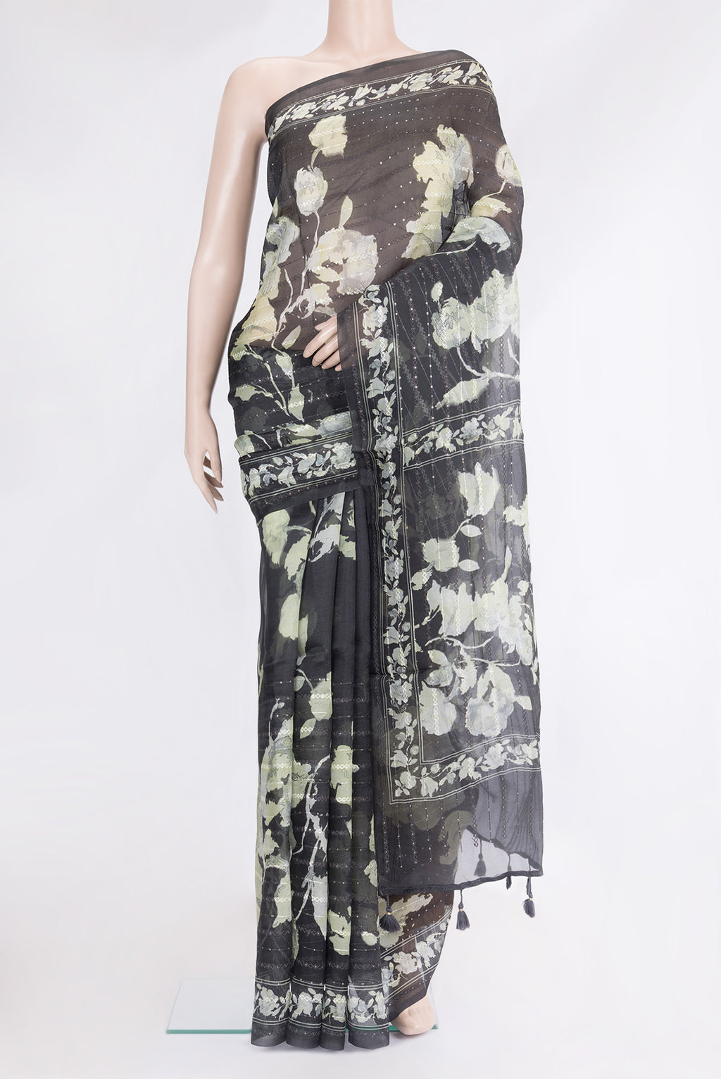 Black Organza Silk Saree with Embroidery on the body and Embroidery Border.  displayed on a mannequin