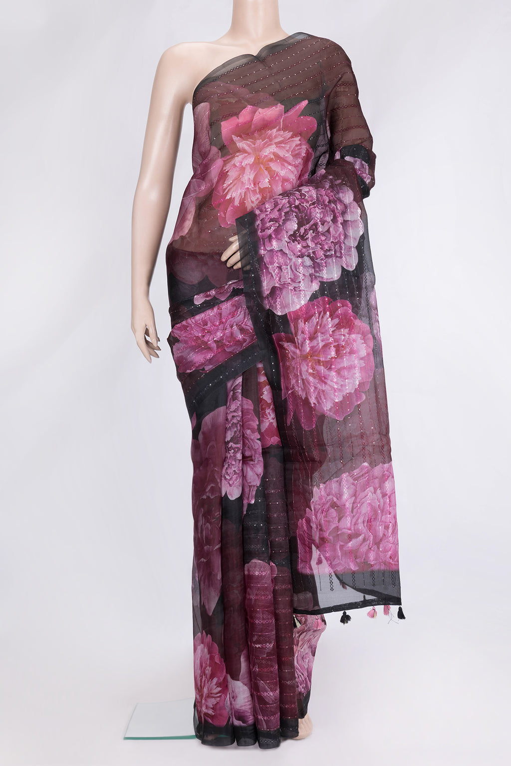 Black Dual Tone Organza Silk Saree with Embroidery on the body and Embroidery Border.  displayed on a mannequin