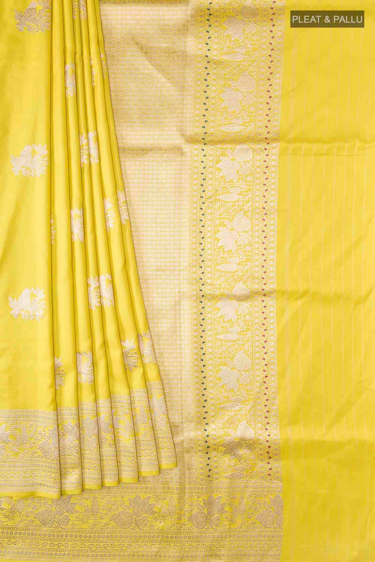 Pleats and pallu of Yellow Banarasi Silk Saree with Zari Butta on the body and Zari Border