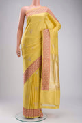 Yellow Banarasi Silk Saree with Zari Butta on the body and Zari Border displayed on a mannequin