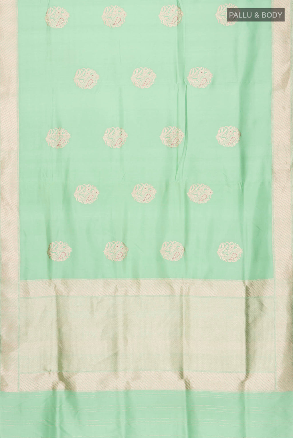 Flat view of Green Banarasi Silk Saree with Zari Butta on the body and Zari Border