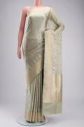 Green Banarasi Silk Saree with Zari Butta on the body and Zari Border displayed on a mannequin