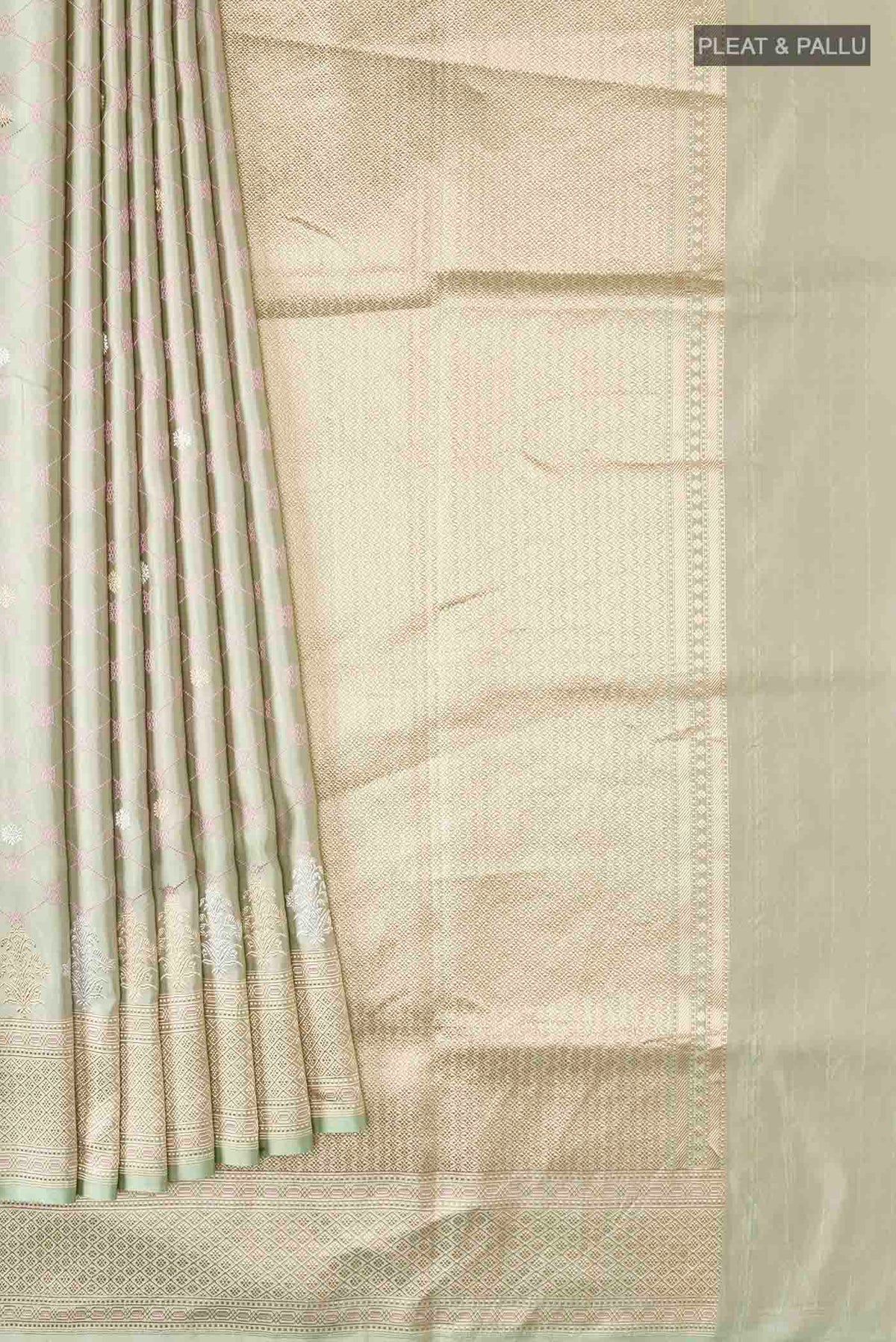 Pleats and pallu of Green Banarasi Silk Saree with Zari Butta on the body and Zari Border