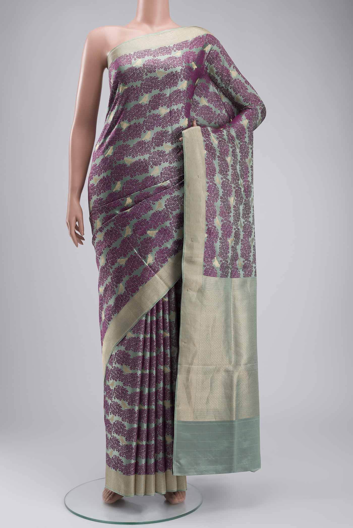 Sea Green Banarasi Silk Saree with Jacquard With Zari Butta on the body and Zari Border displayed on a mannequin