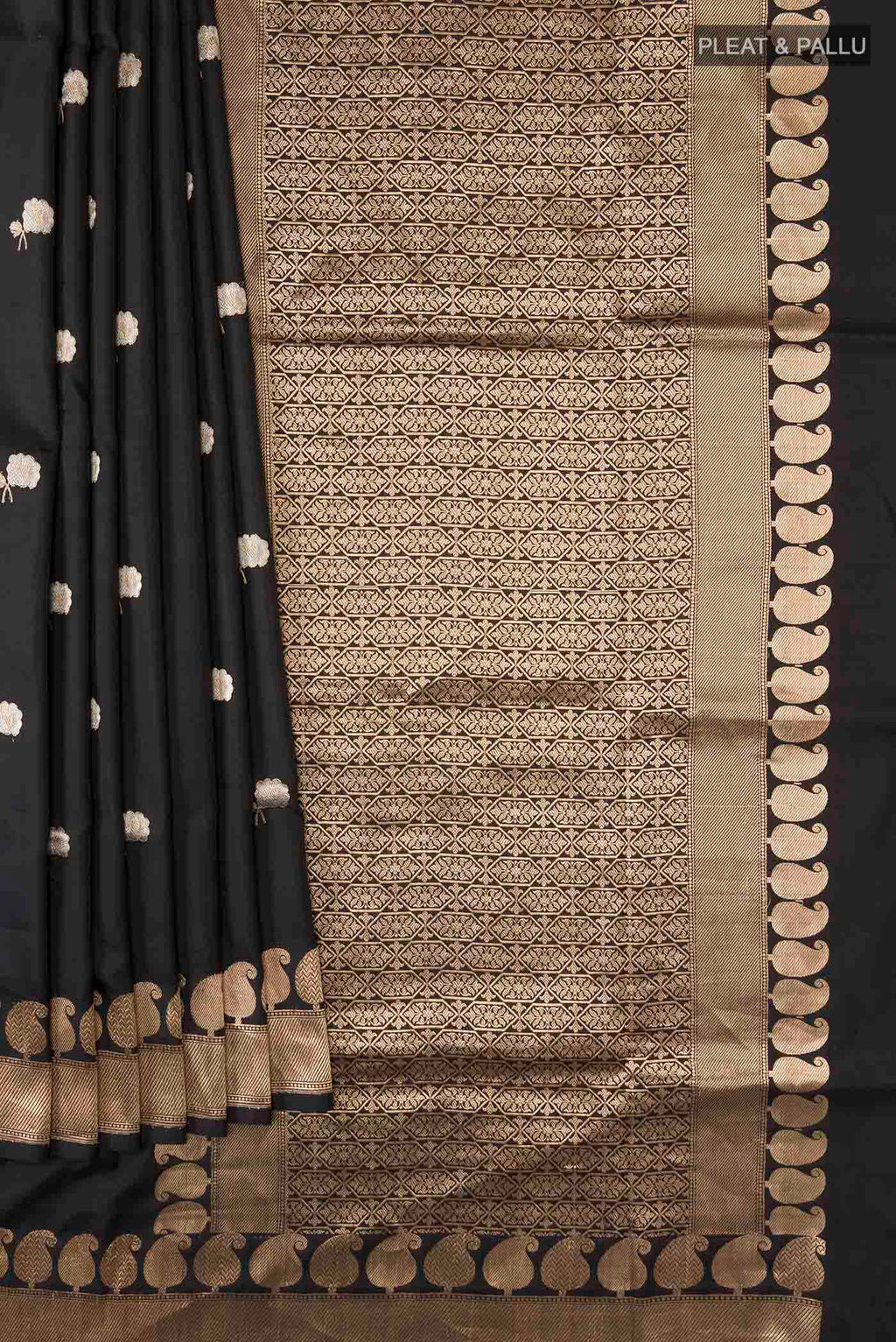 Pleats and pallu of Black Banarasi Katan Silk Saree with Zari Butta on the body and Zari Border