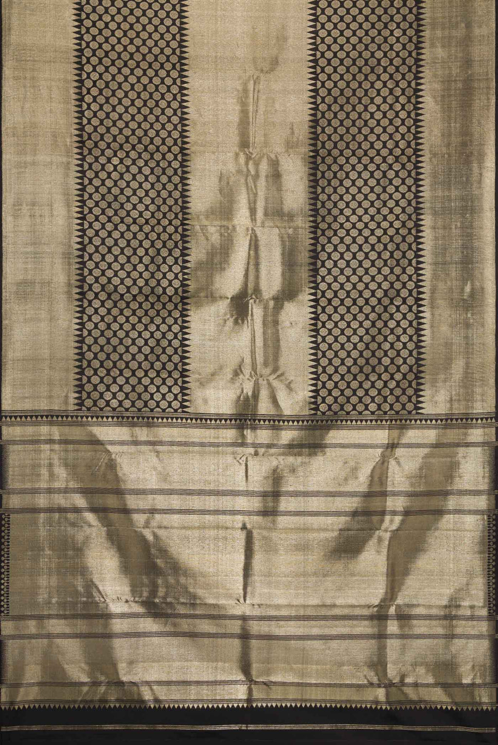Flat view of Black Dual Tone Kanchipuram Silk Saree with Zari Brocade on the body and Zari Border. 