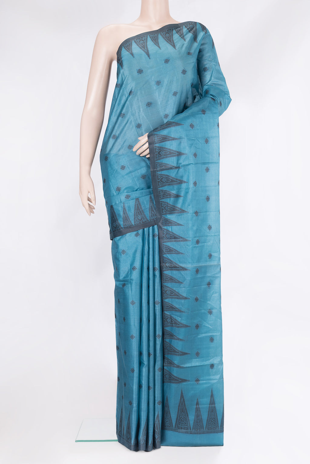 Peacock Blue Banarasi Tussar Silk Saree with Thread Butta on the body and Temple Border.  displayed on a mannequin
