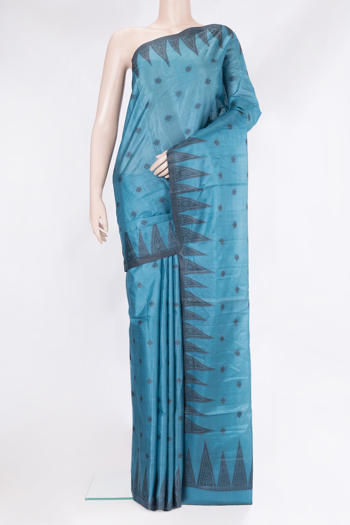 Peacock Blue Banarasi Tussar Silk Saree with Thread Butta on the body and Temple Border.  displayed on a mannequin