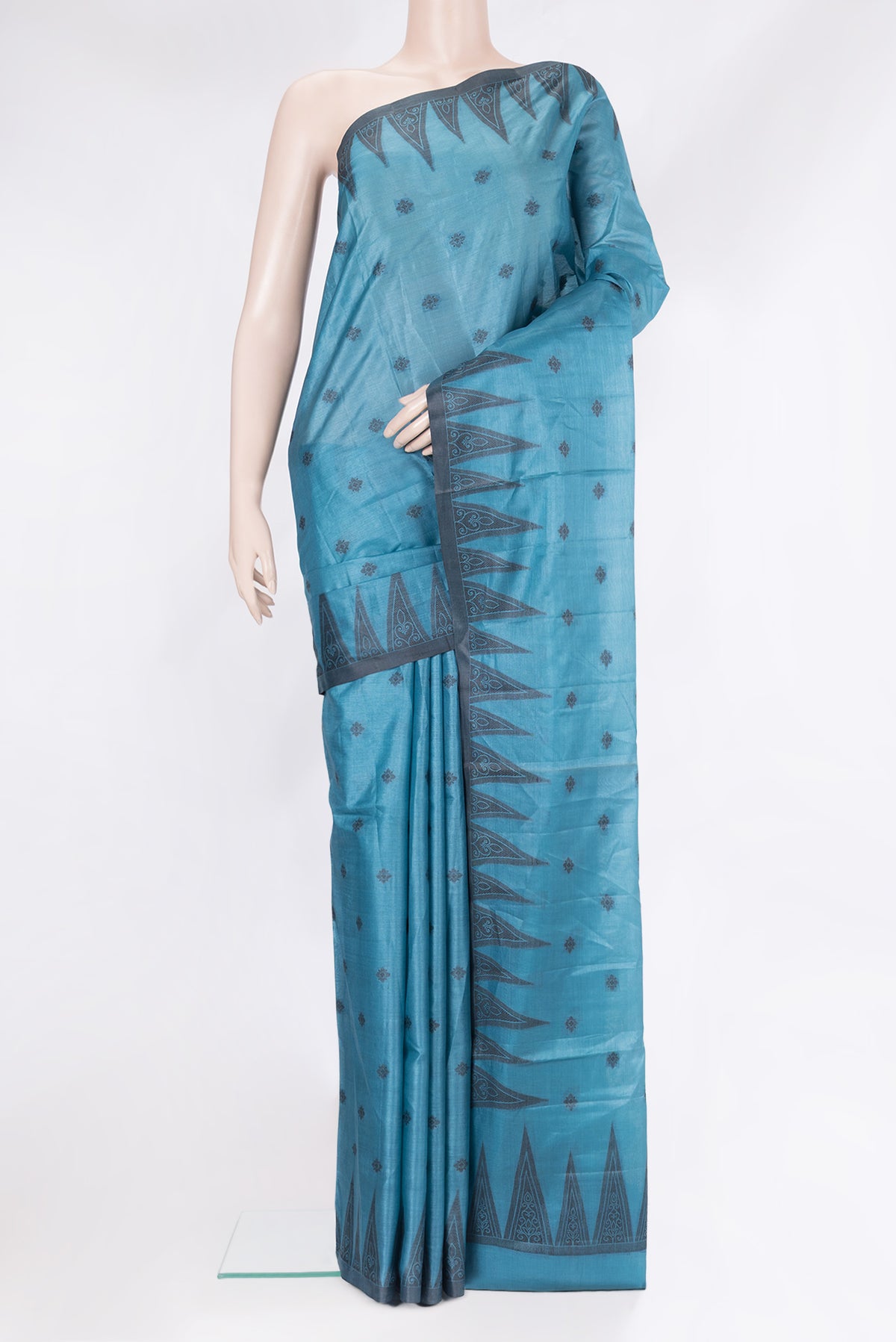 Peacock Blue Banarasi Tussar Silk Saree with Thread Butta on the body and Temple Border.  displayed on a mannequin