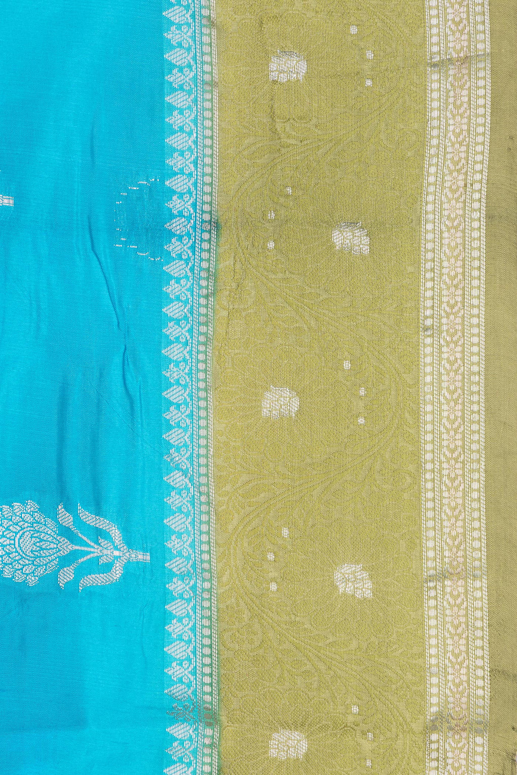 Border image of Sky Blue Dual Tone Tussar Silk Saree with Zari Butta on the body and Fancy Border. 