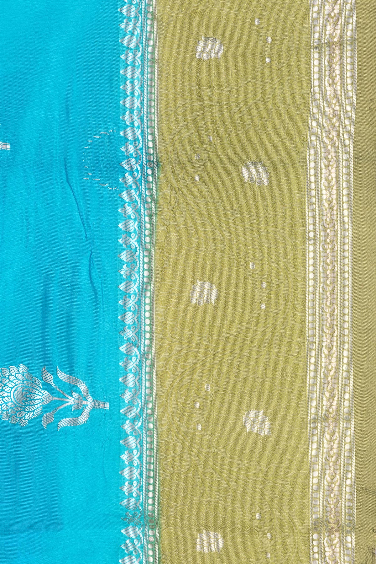Border image of Sky Blue Dual Tone Tussar Silk Saree with Zari Butta on the body and Fancy Border. 