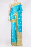 Sky Blue Dual Tone Tussar Silk Saree with Zari Butta on the body and Fancy Border.  displayed on a mannequin
