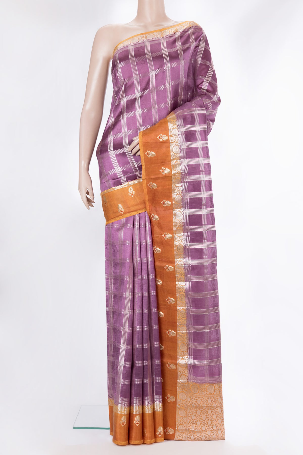 Pure Silk Purple Dual Tone Tussar Saree with Checked design on the body and Fancy Border.  displayed on a mannequin