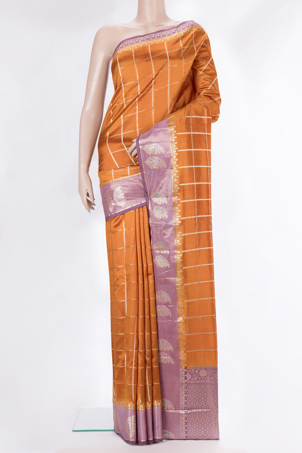 Pure Silk Rust Dual Tone Tussar Saree with Checked design on the body and Fancy Border.  displayed on a mannequin