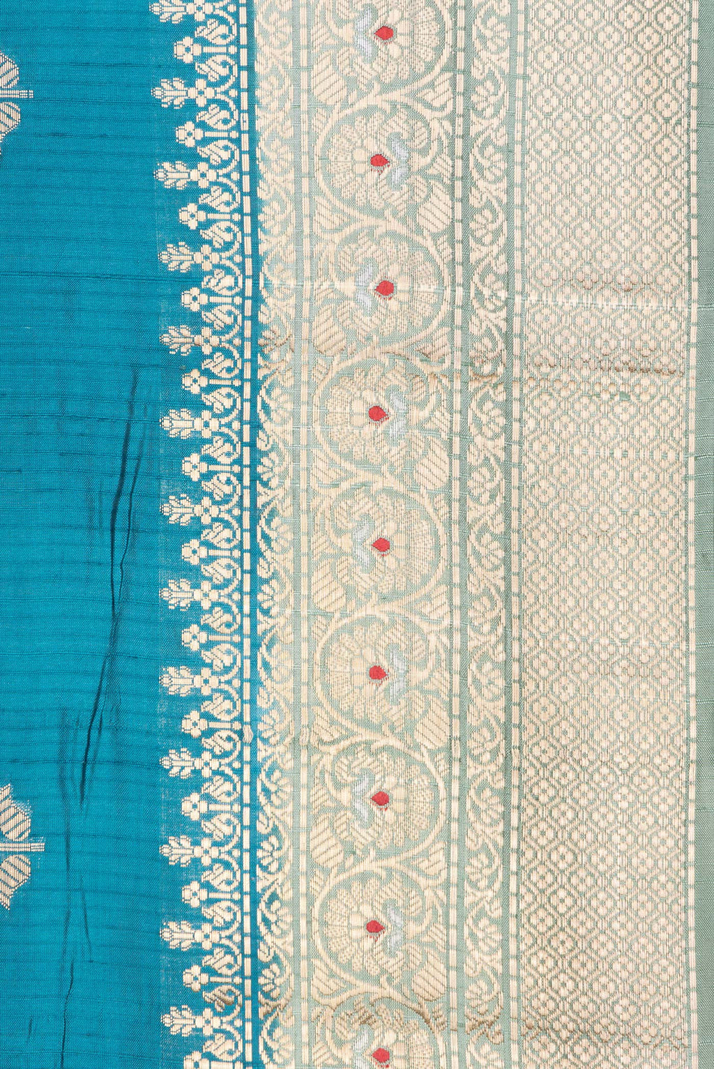 Border image of Pure Silk Peacock Blue Dual Tone Tussar Saree with Zari Butta on the body and Fancy Border. 