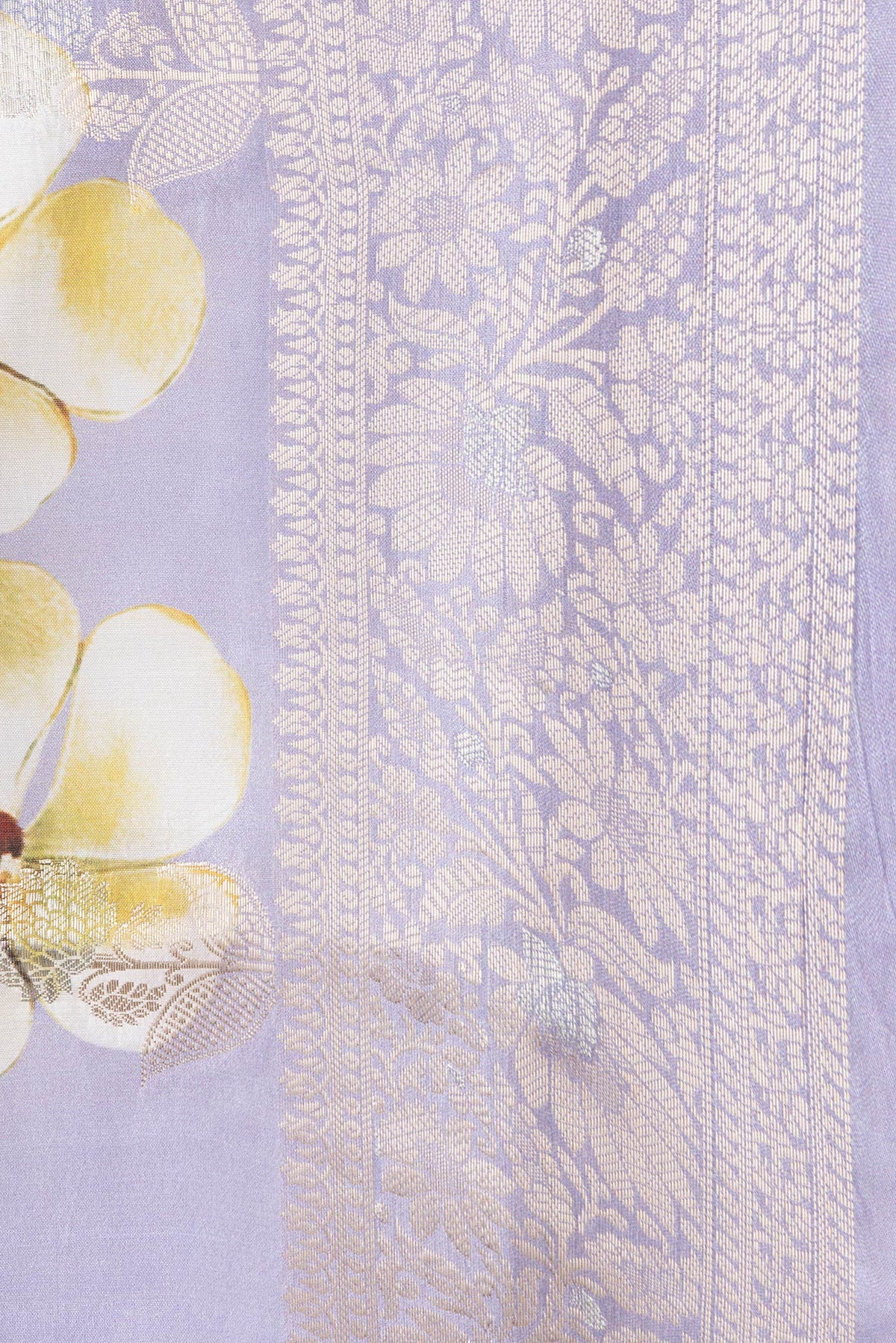 Border image of Lavender Dual Tone Tussar Silk Saree with Zari Butta on the body and Zari Border. 