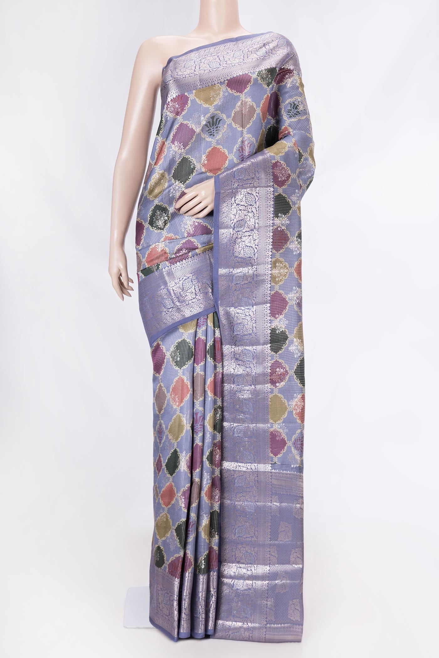 Lilac Banarasi Raw Silk Saree with Zari And Thread Butta on the body and Zari Border displayed on a mannequin