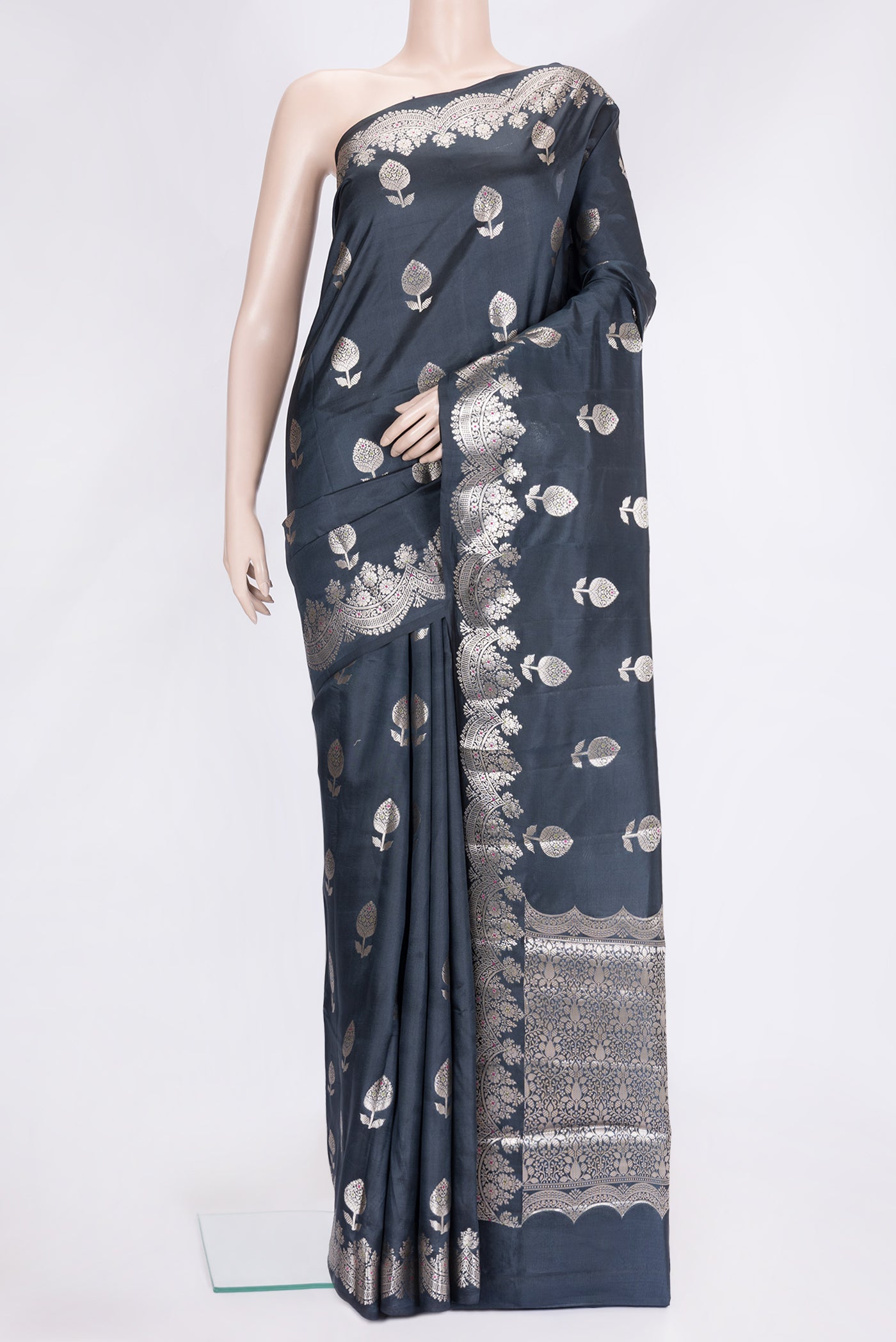 Black Dual Tone Tussar Silk Saree with Zari Butta on the body and Fancy Border.  displayed on a mannequin
