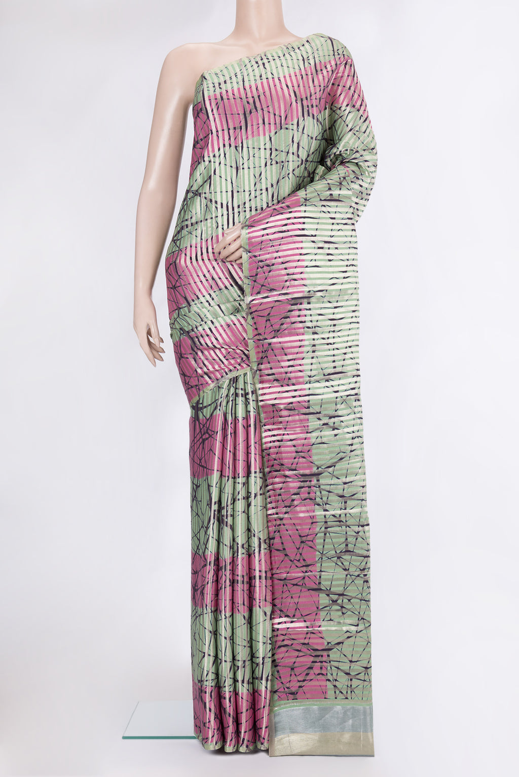 Multi Color Tussar Silk Saree with Stripes on the body and Without Border.  displayed on a mannequin