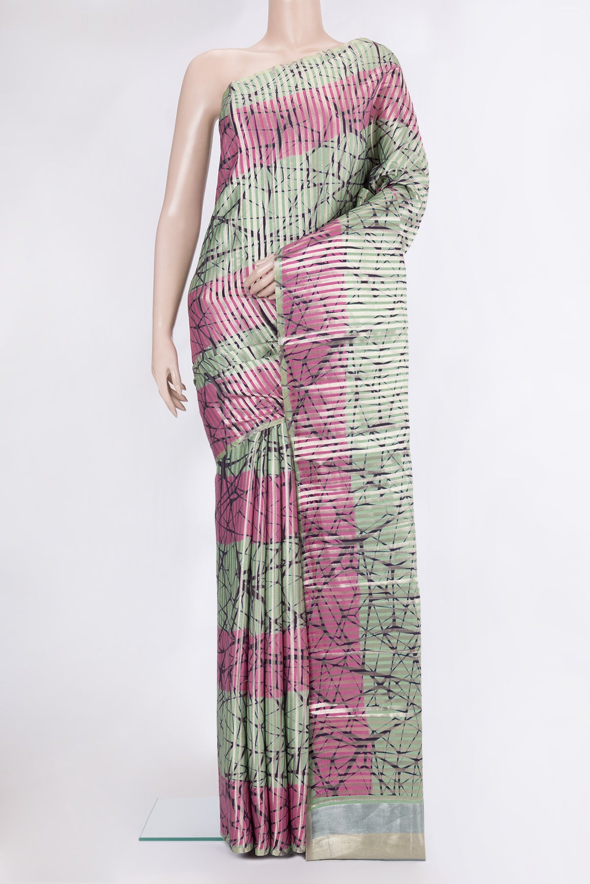 Multi Color Tussar Silk Saree with Stripes on the body and Without Border.  displayed on a mannequin