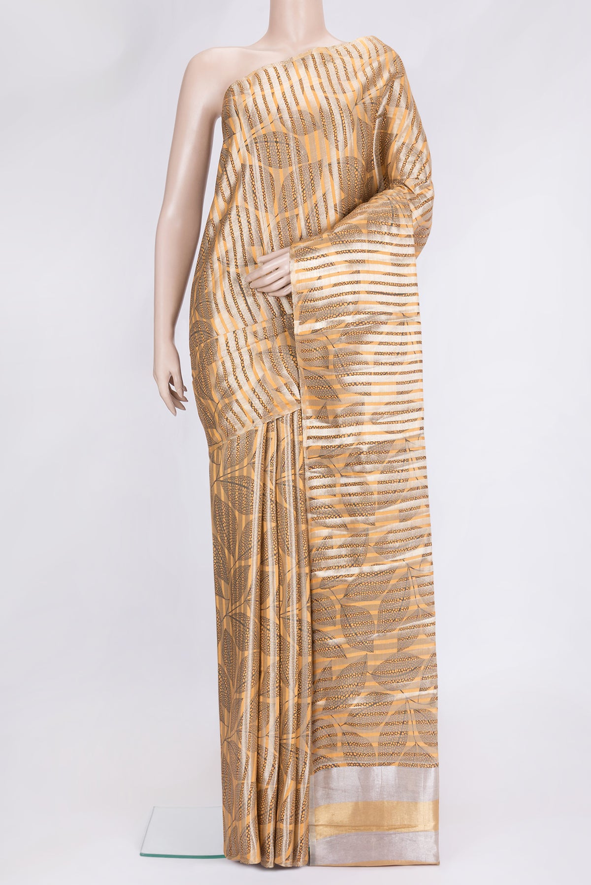 Sandal Dual Tone Tussar Silk Saree with Stripes on the body and Thin Zari Line.  displayed on a mannequin
