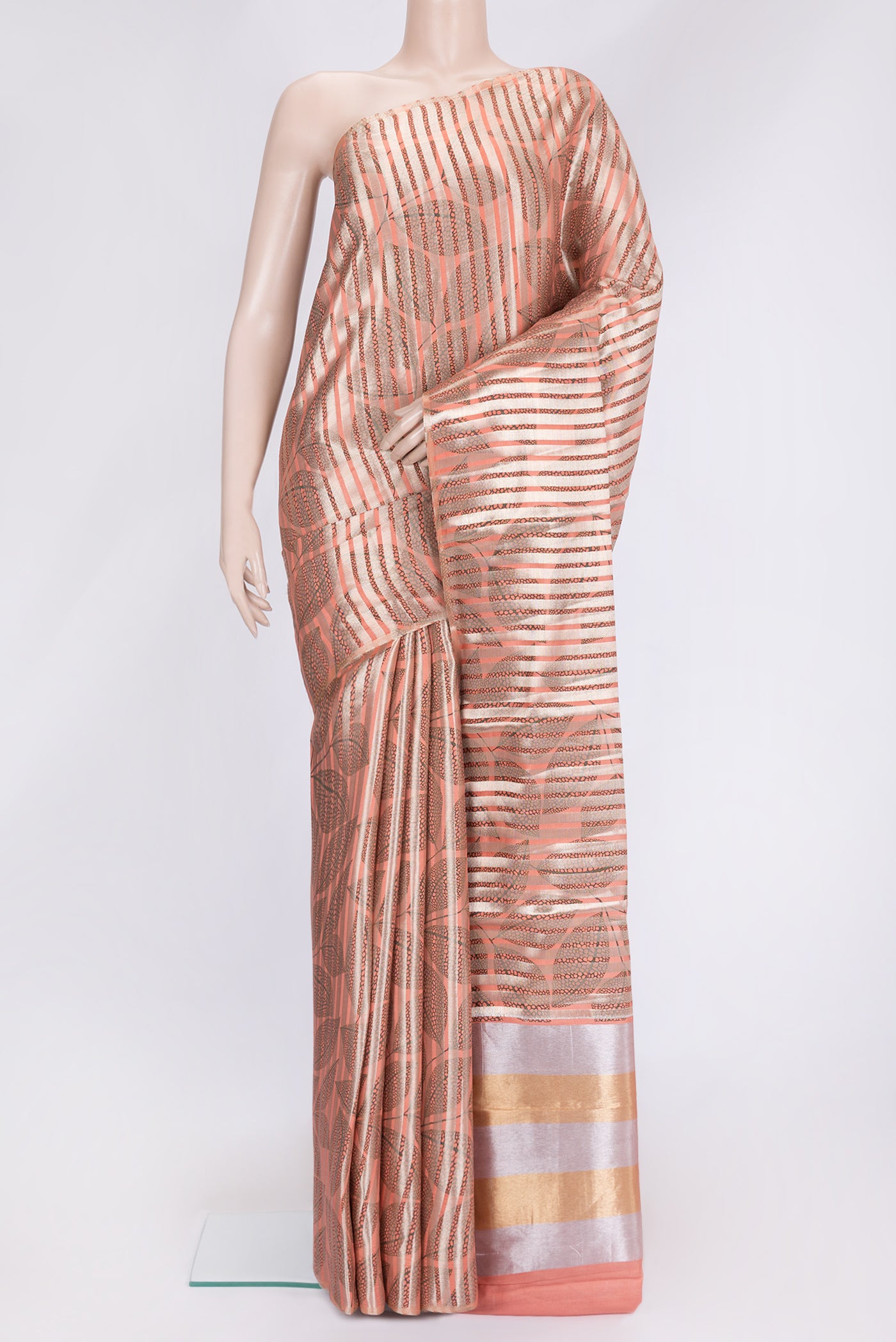 Peach Dual Tone Tussar Silk Saree with Stripes on the body and Without Border.  displayed on a mannequin