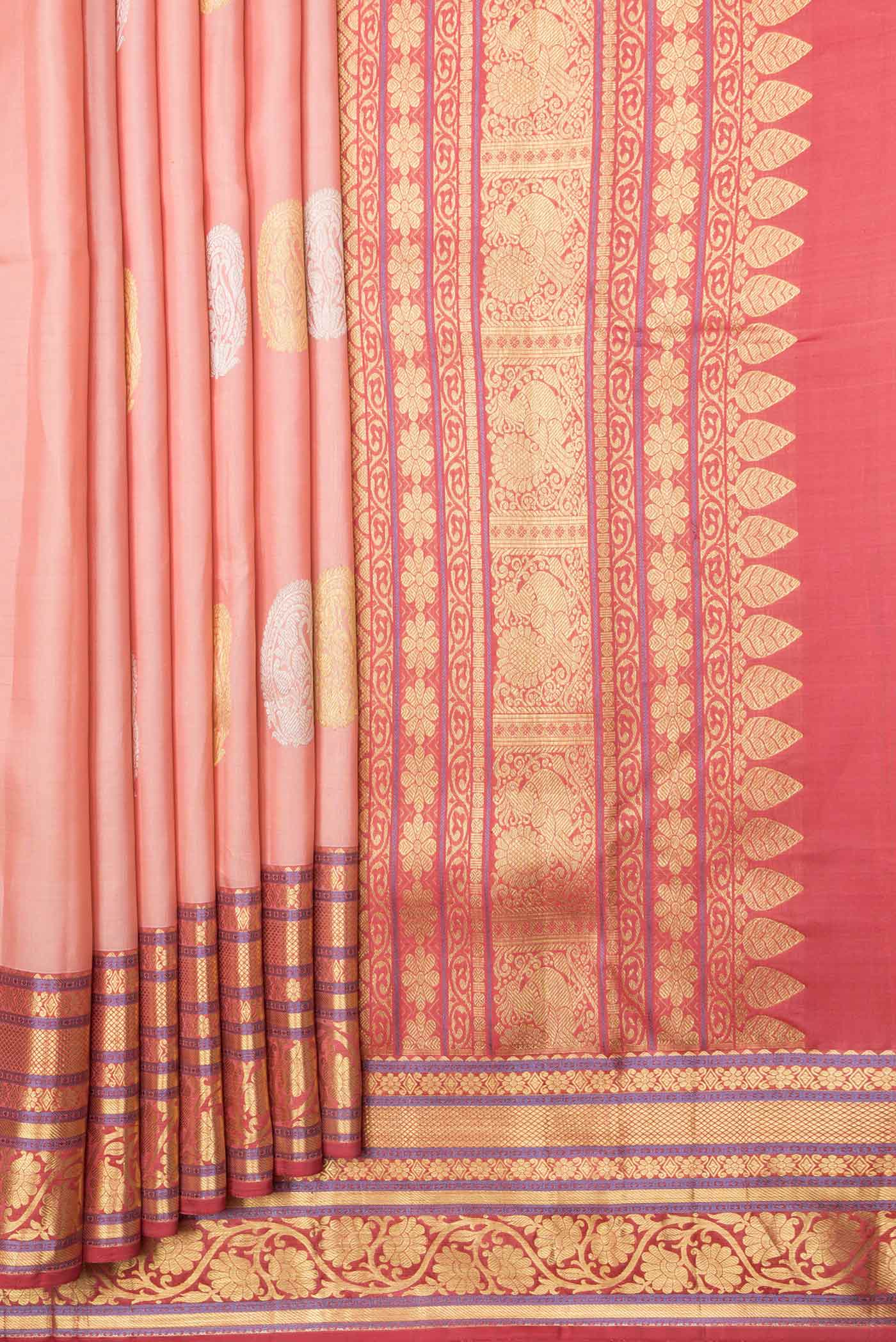 Pleats and pallu of Golden Peach Dual Tone Kanjivaram Saree with Zari Butta on the body and Zari Border. 